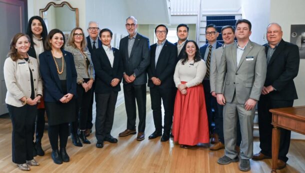 Several members of DENSO’s leadership team, including CEO of DENSO North America Tomoyuki Arakawa (sixth from left), recently met with personnel from the UTC Research Institute and UTC executives during a visit to campus. Photo courtesy of UTC Research Institute.